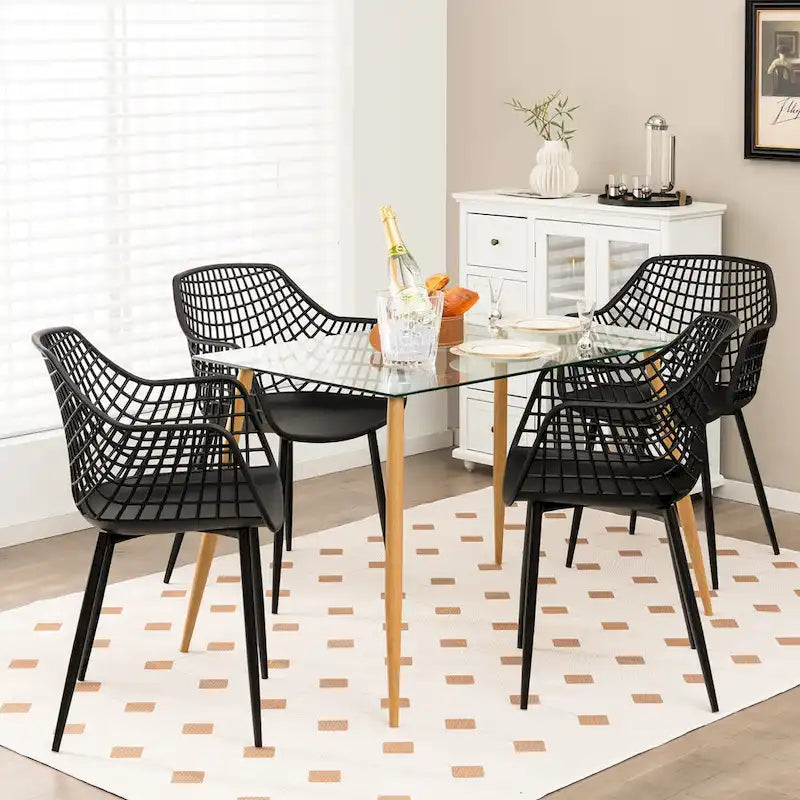 Chaises de salle à manger modernes (lot de 4) — Coque en plastique avec design ajouré, associées à des pieds en métal