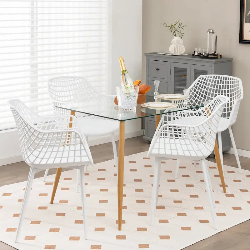 Chaises de salle à manger modernes (lot de 4) — Coque en plastique avec design ajouré, associées à des pieds en métal