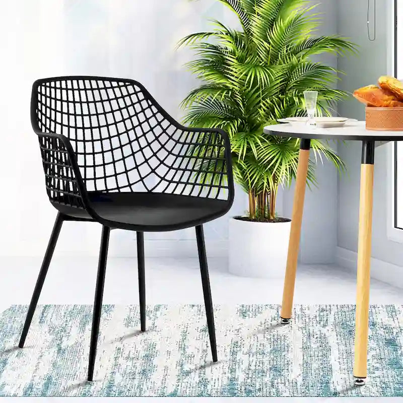 Chaises de salle à manger modernes (lot de 4) — Coque en plastique avec design ajouré, associées à des pieds en métal