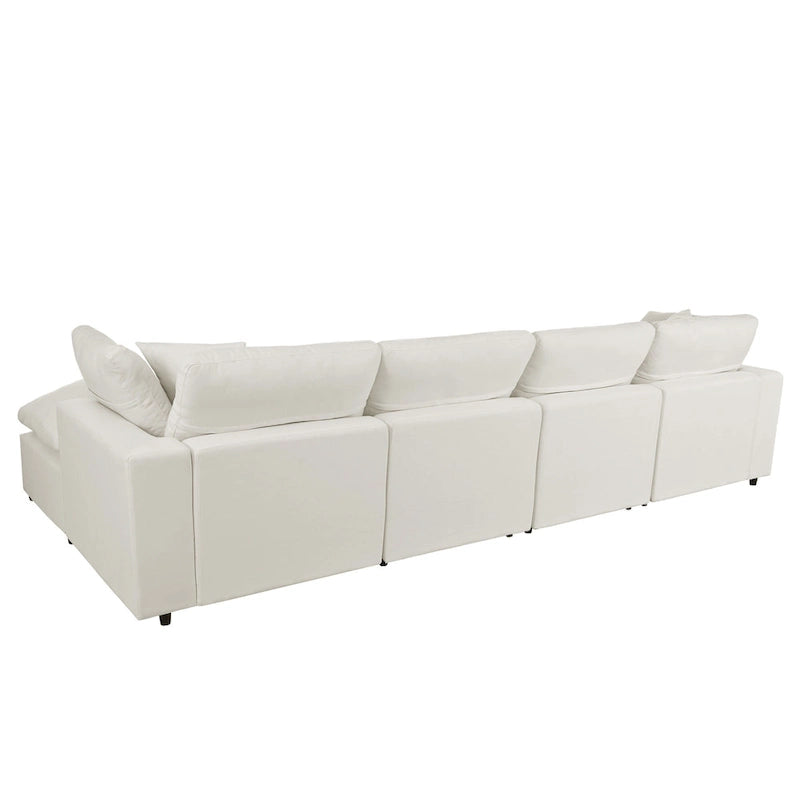 Un grand canapé d'angle moderne en U, doté de deux méridiennes spacieuses et d'un pouf amovible, parfait pour le salon.